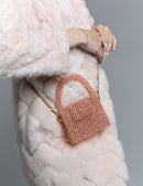 Sac fait à la main avec des micro cristaux roses