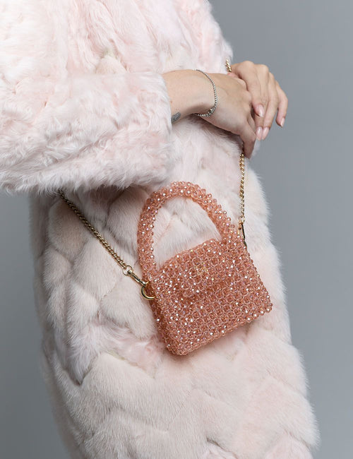 Sac fait à la main avec des micro cristaux roses