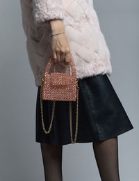 Sac fait à la main avec des micro cristaux roses