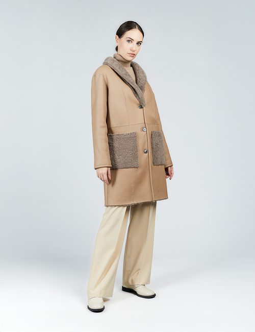 Manteau en peau de mouton réversible avec poches plaquées cognac 90 cm