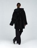 Cappotto in montone con zip e cappuccio reversibile nero 80cm