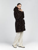 Knee-length mink coat with hood and black belt, 90cm.
