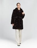 Knee-length mink coat with hood and black belt, 90cm.