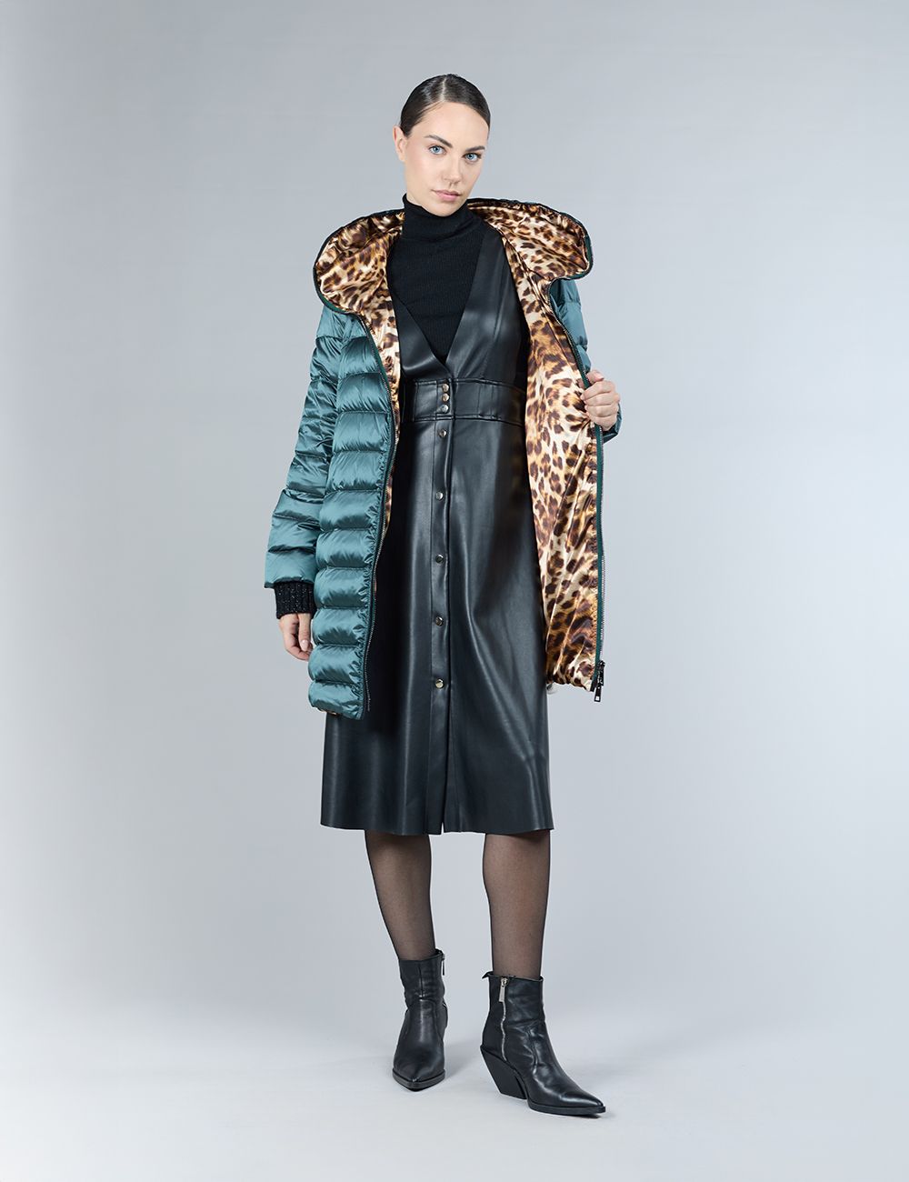 Piumino con decorazione in shearling