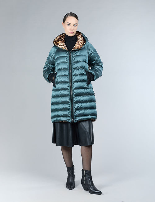 Piumino con decorazione in shearling