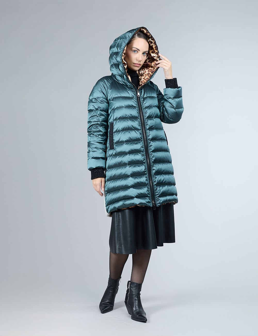 Piumino con decorazione in shearling
