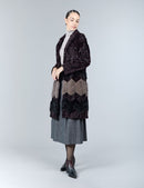 Manteau en peau d'agneau et vison