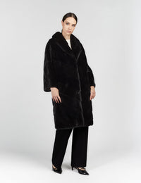 Mink coat with English collar and black diagonal processing, 100 cm long.