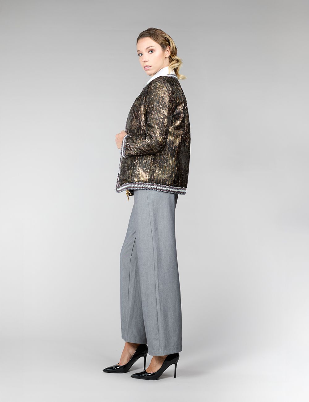 Veste réversible en vison, avec un motif géométrique, de couleur beige, mesurant 65 cm.