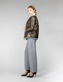 Veste réversible en vison, avec un motif géométrique, de couleur beige, mesurant 65 cm.