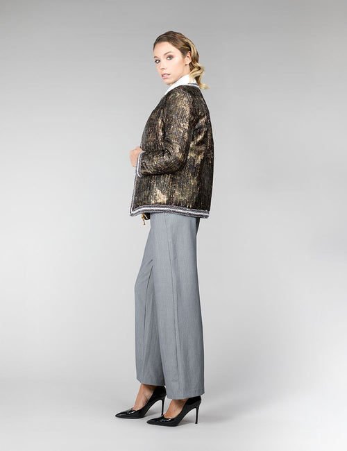 Veste réversible en vison, avec un motif géométrique, de couleur beige, mesurant 65 cm.