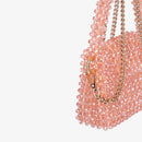 Sac fait à la main avec des micro cristaux roses