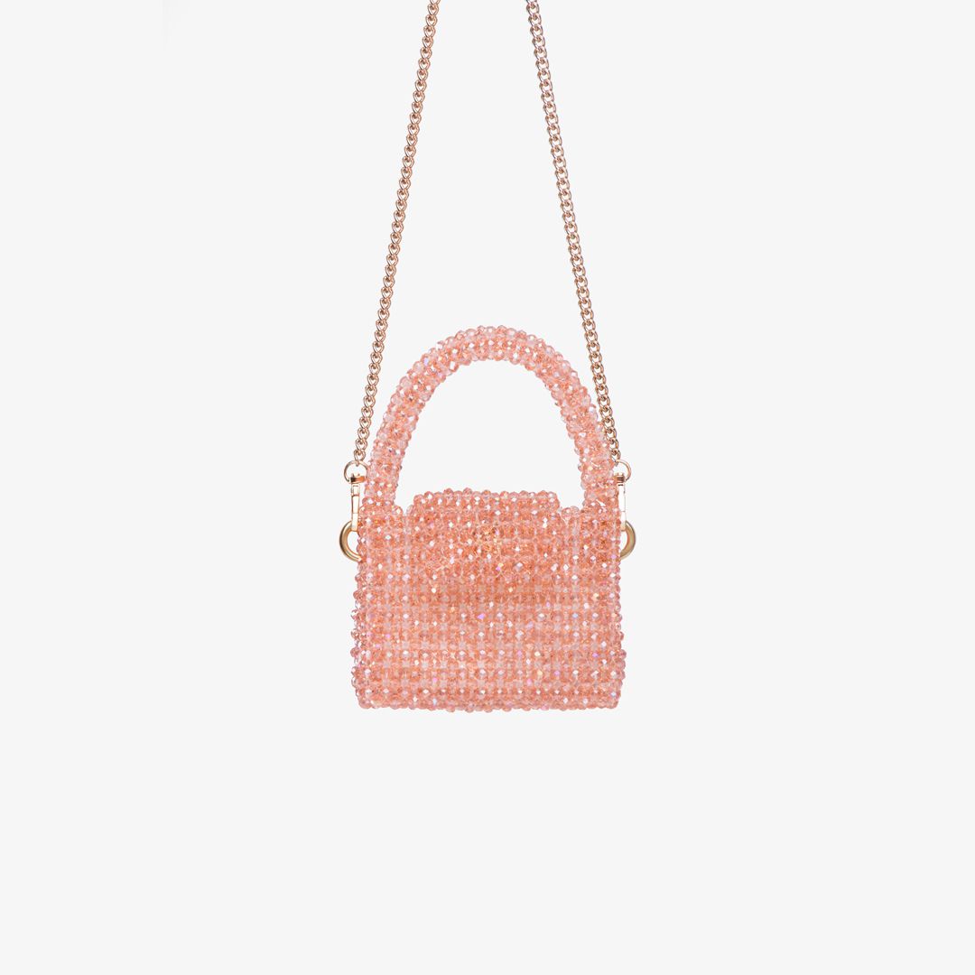 Sac fait à la main avec des micro cristaux roses
