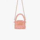 Sac fait à la main avec des micro cristaux roses