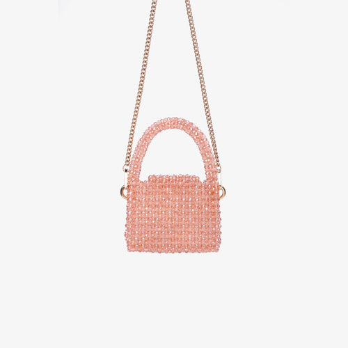 Sac fait à la main avec des micro cristaux roses