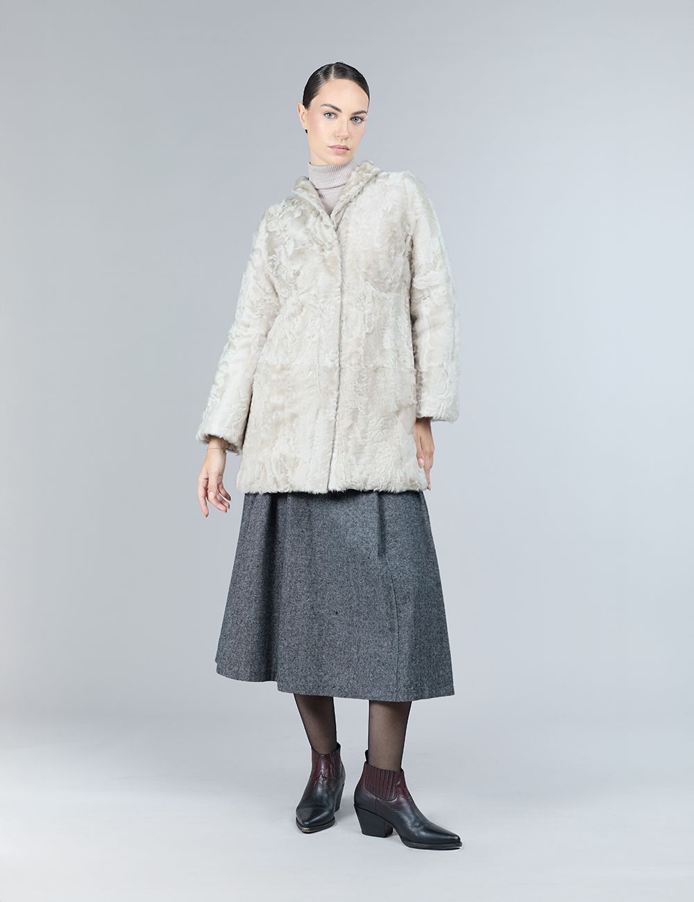 Reversible lamb skin coat