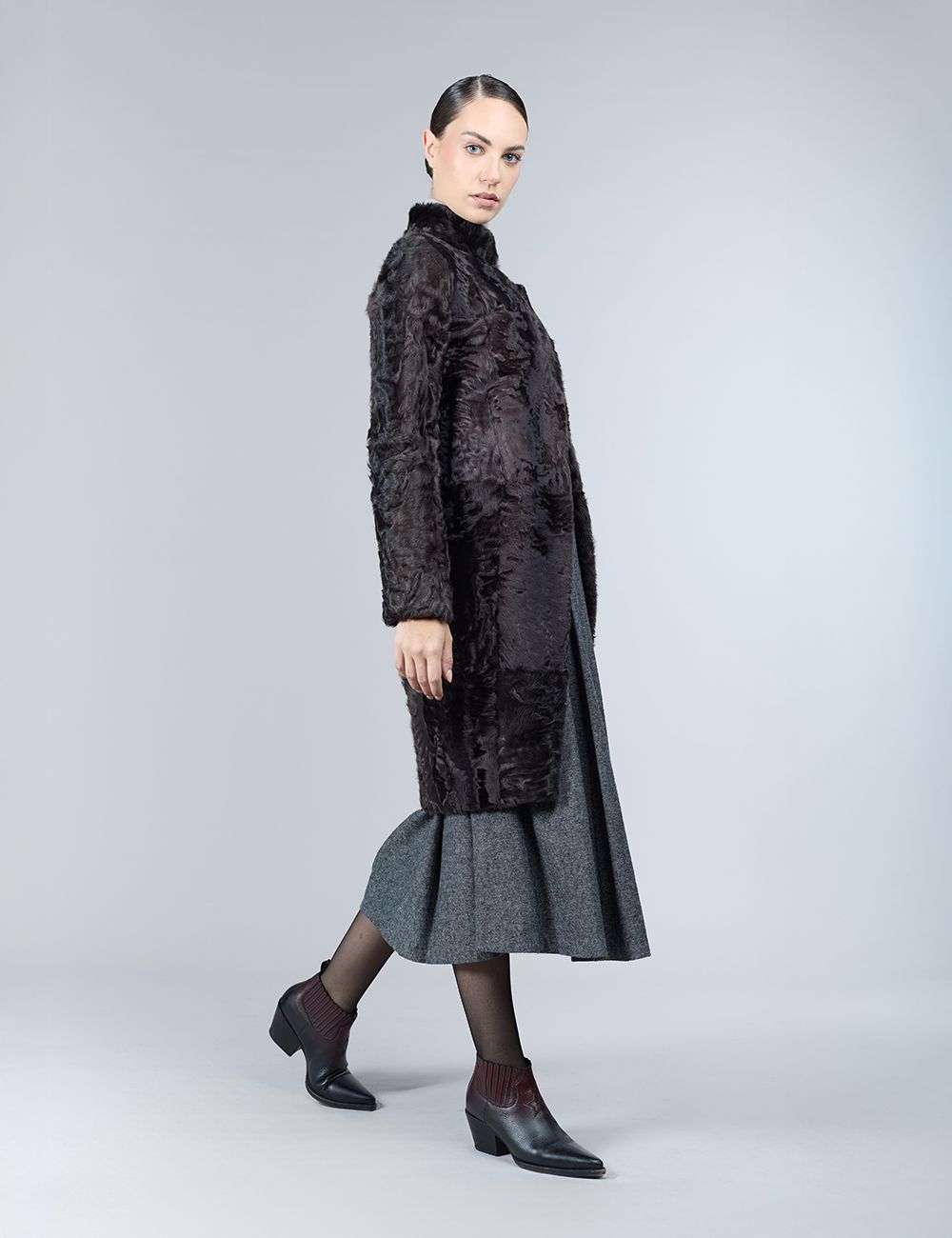 Reversible lamb skin coat