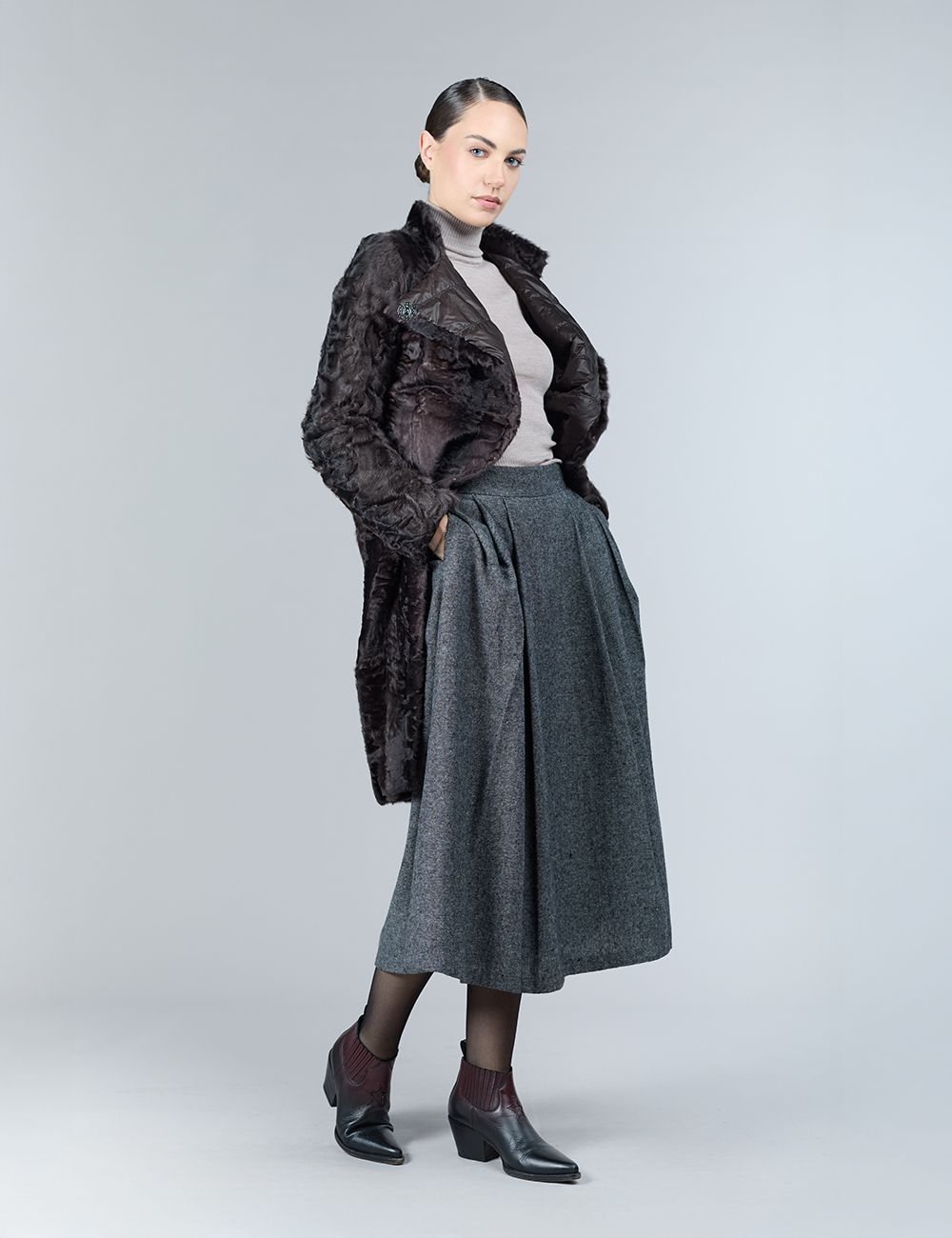Reversible lamb skin coat