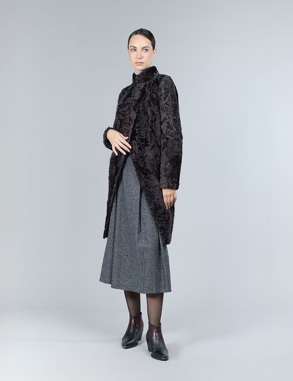 Reversible lamb skin coat