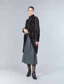 Reversible lamb skin coat