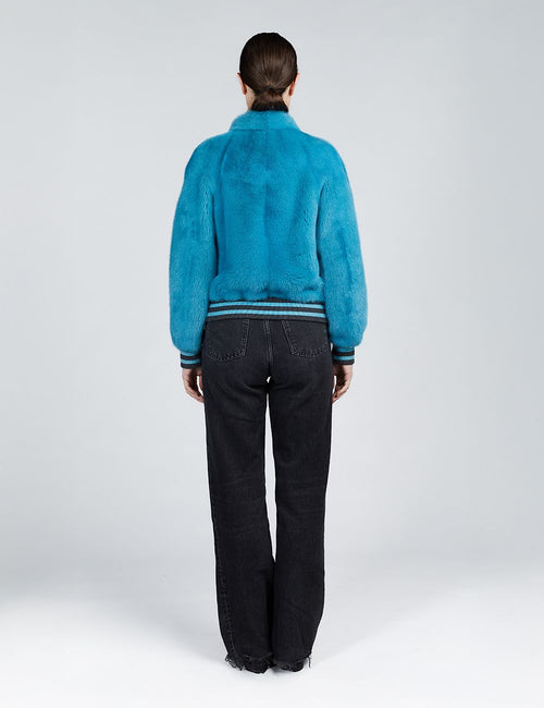 Bomber en vison avec fermeture éclair turquoise de 55cm