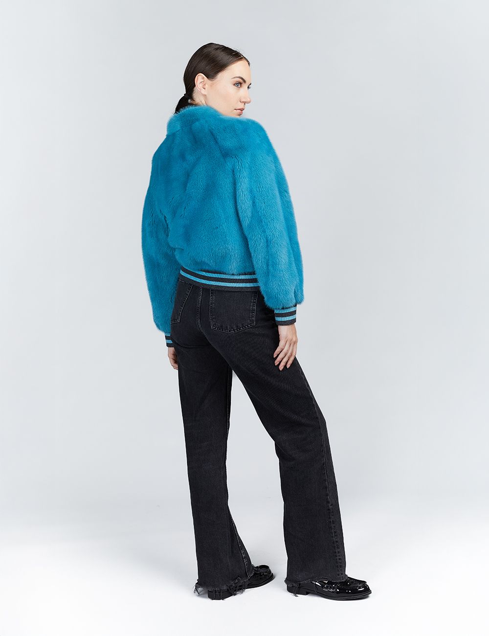 Bomber in visone con chiusura a zip turchese 55cm