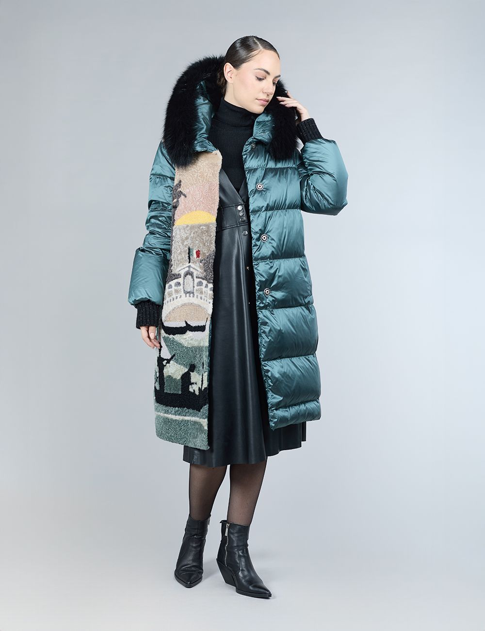Piumino con decorazione in shearling