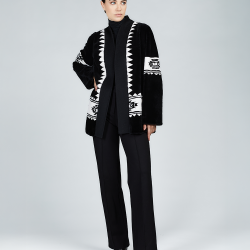 Cardigan in black rex with tribal print and belt, 75 cm long.